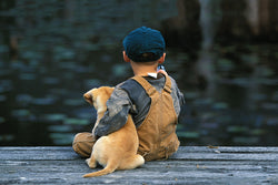 Best Friends on the Fishing Dock (Boy and his Puppy) Poster - Eurographics