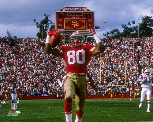 NFL FILE: Jerry Rice (80) and Steve Young (8) of the San Francisco 49ers  during Super Bowl XXIX at Joe Robbie Stadium in Miami, Florida. Young threw  a record 6 touchdowns and