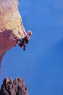 "Hanging On" Rock Climbing - Pomegranate